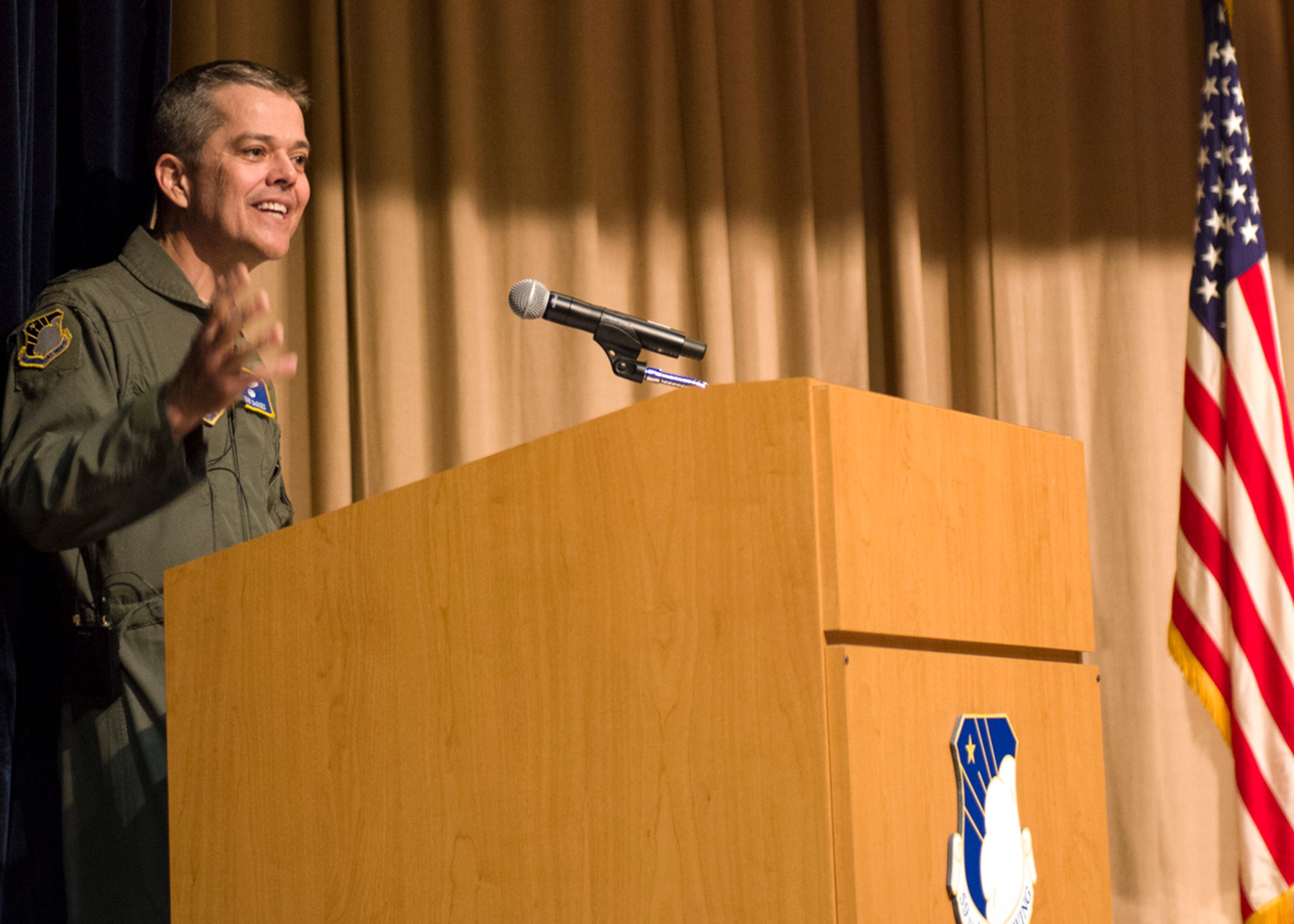 Maj. Gen. John J. DeGoes, 59th Medical Wing commander, addresses the audience after taking command during the June 14 ceremony at the old Wilford Hall Ambulatory Surgical Center auditorium, Joint Base San Antonio-Lackland, Texas. The 59th MDW provides superior graduate medical education and training, state-of-the-art research, and first-class global medical readiness. It also serves as the Air Force functional medical command for Joint Base San Antonio. (U.S. Air Force photo by Staff Sgt. Kevin Iinuma)