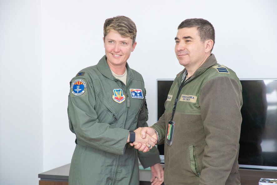 Col. Colleen McBratney, 355th Aerospace Medicine Squadron Commander, Davis-Monthan AFB, Ariz., poses for a photo with Chilean Air Force Commander Claudio Montiglio during a health services administration subject matter expert exchange with the Chilean air rorce at the Hospital Clínico, Santiago, June 4-8. Key U.S. and Chilean air force military health specialists discussed ways to improve medical administration practices, marking the first time this type of exchange has taken place in Chile. (U.S. Air Force photo by Staff Sgt. Danny Rangel)