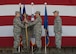 U.S. Air Force Col. Steven Anderson, 8th Maintenance Group commander, receives the guidon from Col. John Bosone, 8th Fighter Wing commander, during a change of command ceremony June 15, 2018, at Kunsan Air Base, Republic of Korea. Anderson accepted command of the 8th MXG and received the title of “Phoenix.” (U.S. Air Force photo by Staff Sgt. Victoria H. Taylor)