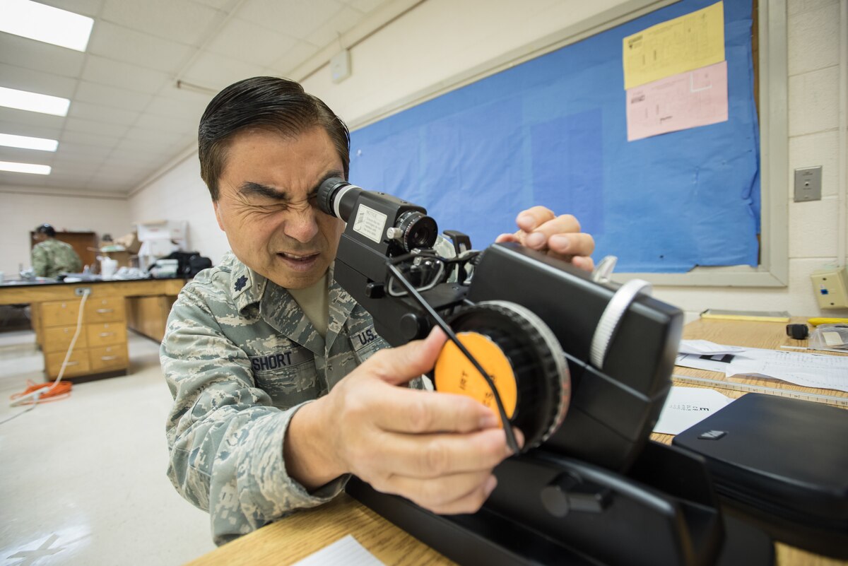 U.S. Air Force Lt. Col. Ronald Short, an optometrist with the California Air National Guard’s 163rd Attack Wing, tests optometry equipment for a health-care clinic at Lee County High School in Beattyville, Ky., June 14, 2018. The clinic is one of four being staffed by military health-care professionals in Eastern Kentucky from June 15 to June 24 as part of an Innovative Readiness Training mission called Operation Bobcat. The mission provides military forces with crucial expeditionary training while offering no-cost medical, dental and optometry care to area residents. (U.S. Air National Guard photo by Lt. Col. Dale Greer)