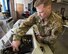 U.S. Army Spc. Cameron Brown, an optical lab technician assigned to the U.S. Navy’s Mobile Optical Support Unit at Naval Weapons Station Yorktown (Pennsylvania), sets up equipment to make eyeglasses for a health-care clinic at Lee County High School in Beattyville, Ky., June 14, 2018. The clinic is one of four being staffed by military health-care professionals in Eastern Kentucky from June 15 to June 24 as part of an Innovative Readiness Training mission called Operation Bobcat. The mission provides military forces with crucial expeditionary training while offering no-cost medical, dental and optometry care to area residents. (U.S. Air National Guard photo by Lt. Col. Dale Greer)