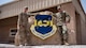 Staff Sgt. Kevin Welch, 386th Expeditionary Civil Engineer Squadron project manager, and Chief Master Sgt. Chad Welch, 386th Air Expeditionary Wing command chief, pose for a photo June 12, 2018, at an undisclosed location in Southwest Asia. The father and son serve as reservists for the 932nd Airlift Wing at Scott Air Force Base, Ill. (U.S. Air Force photo by Staff Sgt. Christopher Stoltz)