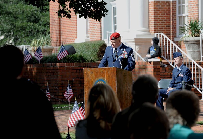 Chief Master Sgt. Bradley Reilly, 14th Operations Group Superintendent, speaks to a crowd during a Veterans Day ceremony Nov. 11, 2017, in Columbus, Mississippi. Reilly was the featured speaker for the ceremony, which also included a parade beforehand. (U.S. Air Force photo by Staff Sgt. Christopher Gross)