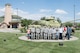 Airmen and family members from the 557th Weather Wing pose for a group photo in front of the Eastern Nebraska Veterans’ Home May 28, 2018, Bellevue, Nebraska. The group volunteered to assist the ENVH in hosting their Memorial Day ceremony. (U.S. Air Force photo by Paul Shirk)