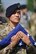 U.S. Air Force Senior Airman Yanny Nguyen, a defender assigned to the 509th Security Forces Squadron, holds the U.S. flag during a flag folding ceremony in remembrance of the six fallen Airmen of Charlie Fire Team at Whiteman Air Force Base, Missouri, June 10, 2018