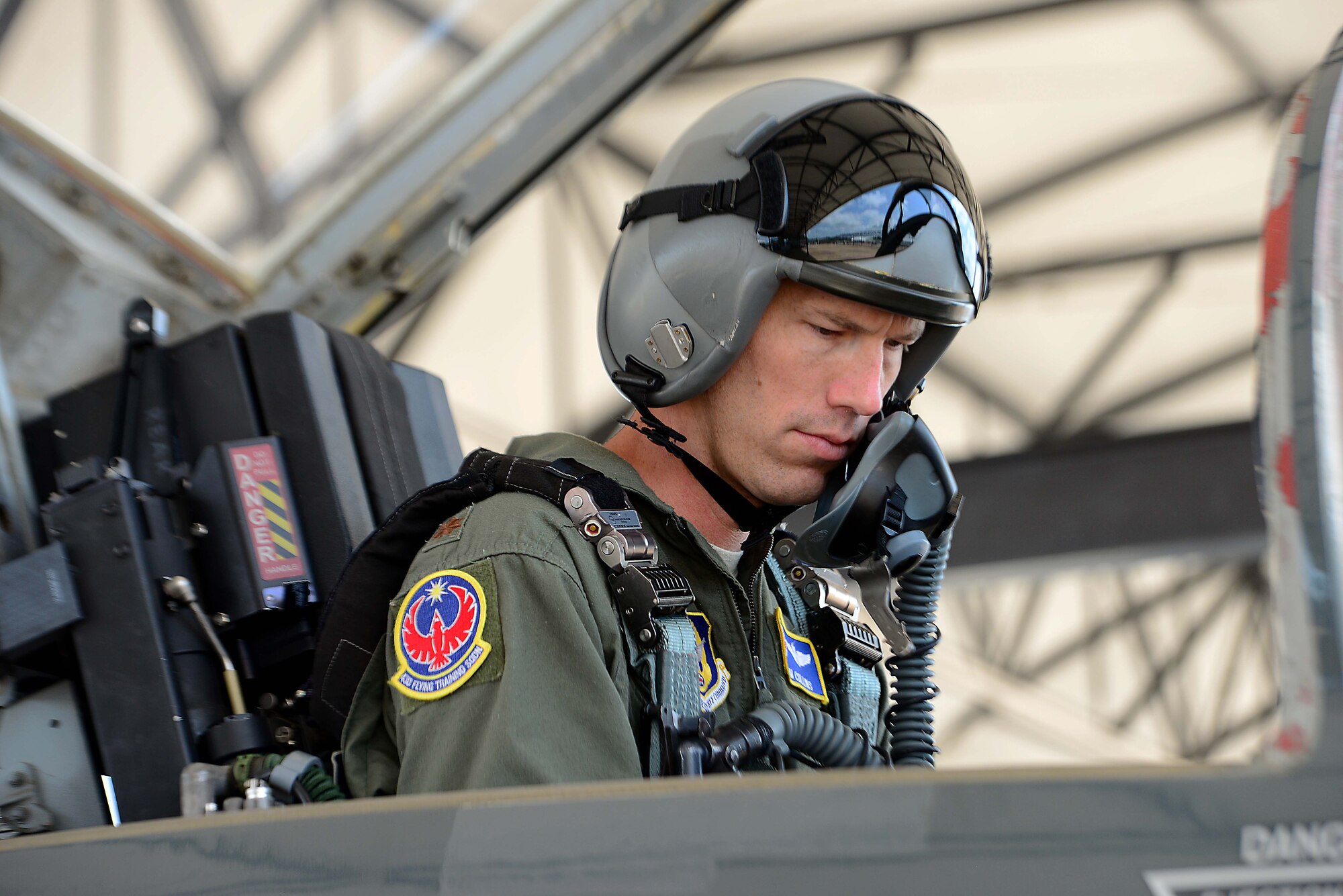 Maj. Thomas Collins, 43rd Flying Training Squadron instructor pilot, reviews his preflight checklist June 12, 2018, on Columbus Air Force Base, Mississippi. The 43rd FTS are usually responsible for 12-20 percent of all pilots produced at Columbus AFB. (U.S. Air Force photo by Airman 1st Class Beaux Hebert)