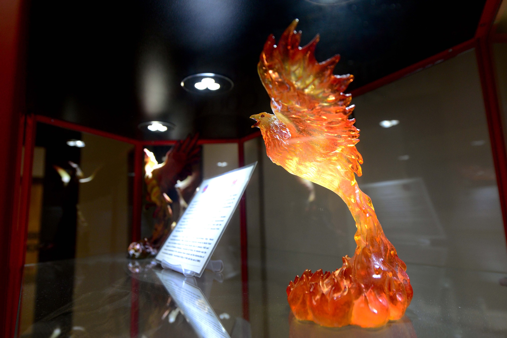 A decorative phoenix sits inside a display case in the 43rd Flying Training Squadron office June 12, 2018, on Columbus Air Force Base, Mississippi. The 43rd FTS, also known as the Firebirds, have been producing pilots at Columbus AFB since 1990. (U.S. Air Force photo by Airman 1st Class Beaux Hebert)