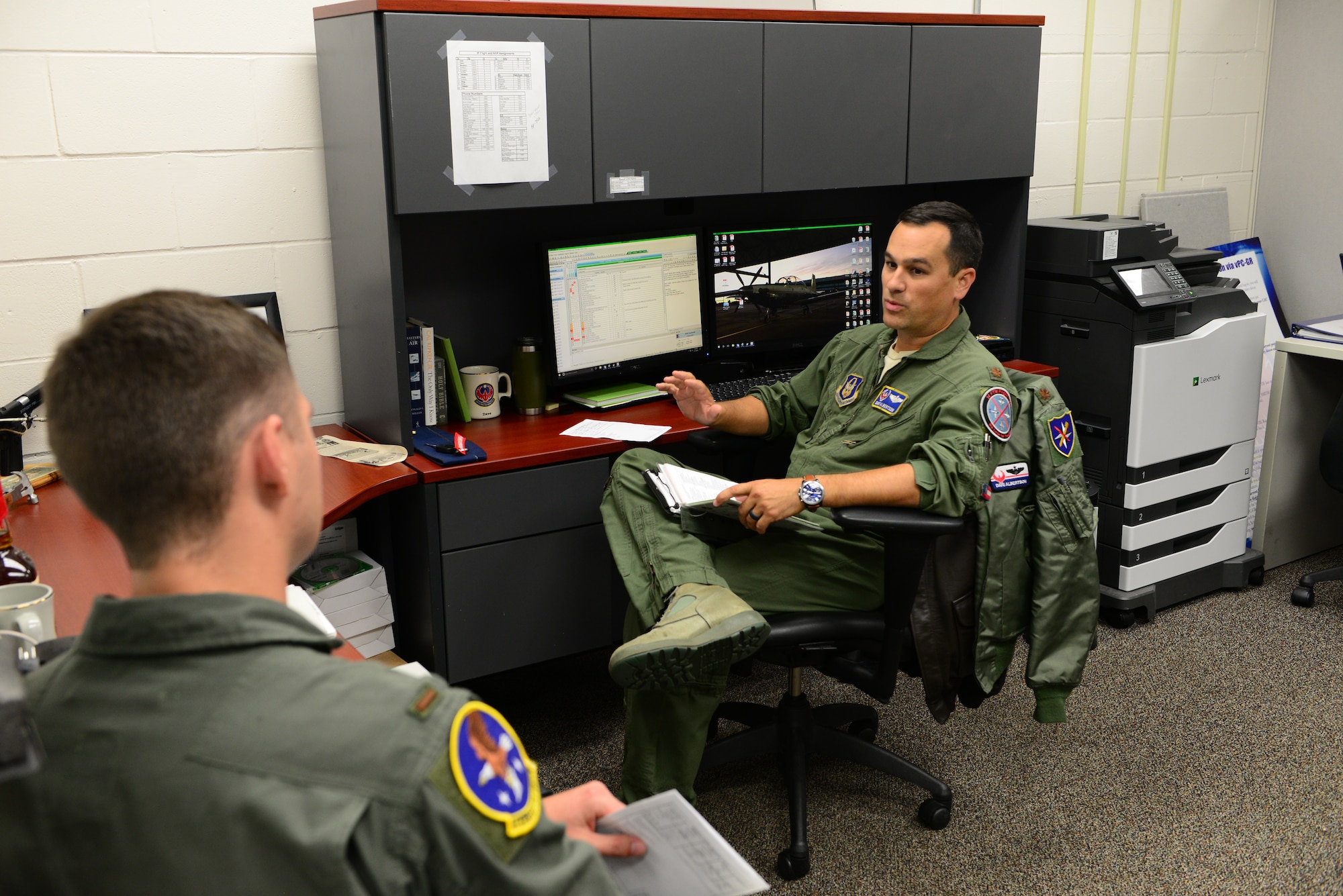 Maj. Dave Albertson, 43rd Flying Training Squadron, instructor pilot, teaches 2nd Lt. Christopher Newman, 14th Student Squadron student pilot, the fundamentals of flying a T-6A Texan II June 12, 2018, on Columbus Air Force
Base, Mississippi. The IPs at the 43rd FTS main goal while they are on station is to fly as many student sorties as possible. (U.S. Air Force photo by Airman 1st Class Beaux Hebert)
