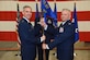 Maj. Gen. Stephen Whiting, 14th Air Force commander, hands the guide-on to Col. Scott Brodeur, 614th Air and Space Operations Center commander, during a change of command ceremony on June 8, 2018, at Vandenberg Air Force Base, Calif. Brodeur assumed command of the 614th AOC from Col. Michael Manor. (U.S. Air Force photo by Tech. Sgt. Jim Araos/Released)