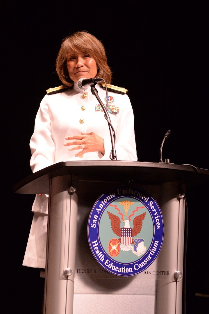 Vice Adm. Raquel Bono, director of the Defense Health Agency, speaks to the graduates and their families during the San Antonio Uniformed Services Health Education Consortium graduation ceremony held June 7 at the Lila Cockrell Theatre in downtown San Antonio.