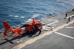 USCG helicopter refuels