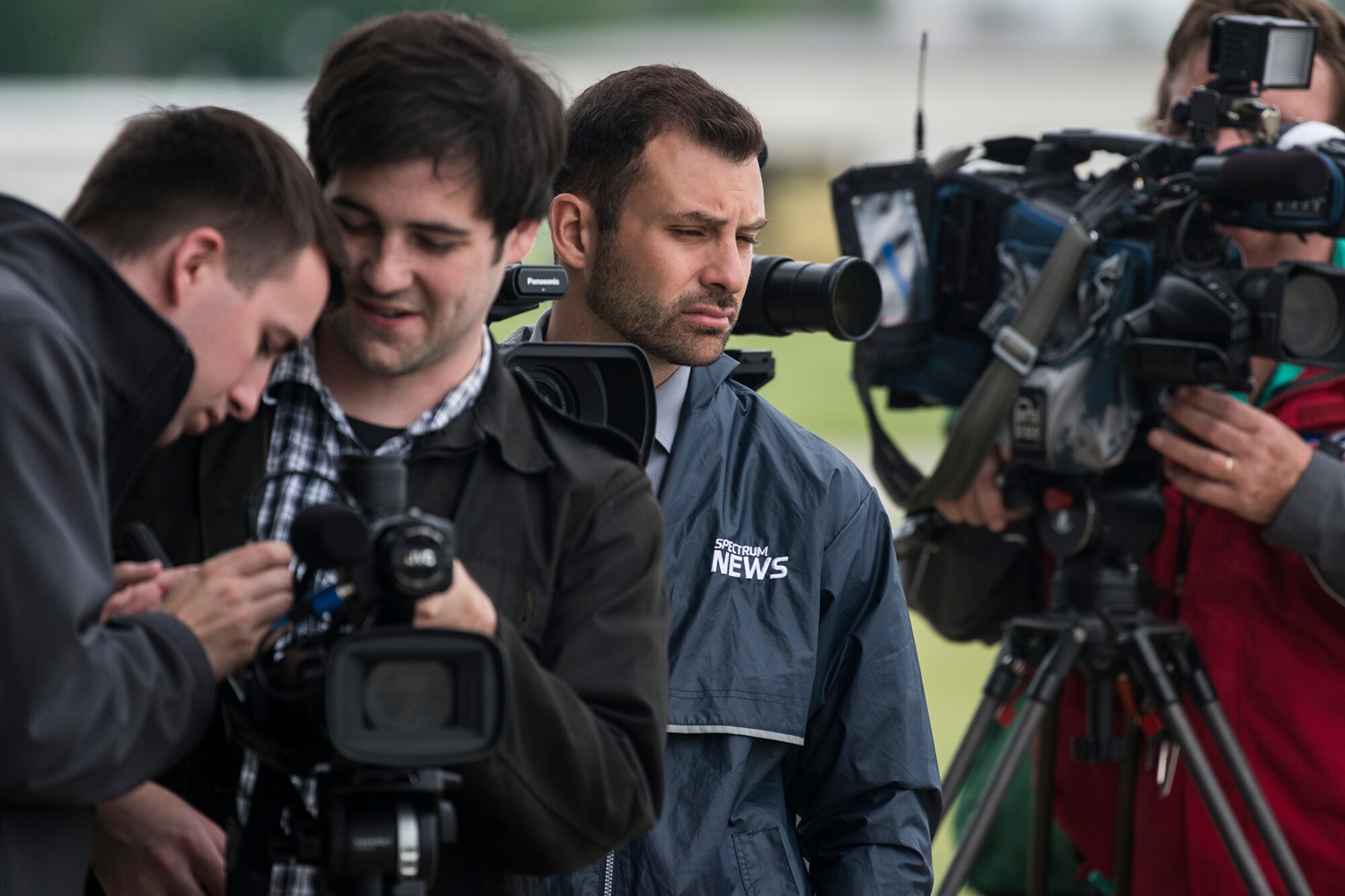 Local and national media wait for the opportunity to interview pilots participating in a Heritage Flight on June 7, 2018, Niagara Falls International Airport, N.Y. The Air Force Heritage Flight Foundation provides dramatic flying displays to the entire world, pairing modern aircraft performances with fighter aircraft from the WWII, Korea and Vietnam eras.
