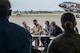 Pilots participating in a Heritage Flight hold a pre-flight briefing prior to takeoff on June 7, 2018, Niagara Falls International Airport, N.Y. The Air Force Heritage Flight Foundation provides dramatic flying displays to the entire world, pairing modern aircraft performances with fighter aircraft from the WWII, Korea and Vietnam eras. (U.S. Air Force photo by Master Sgt. Greg Steele/Released)