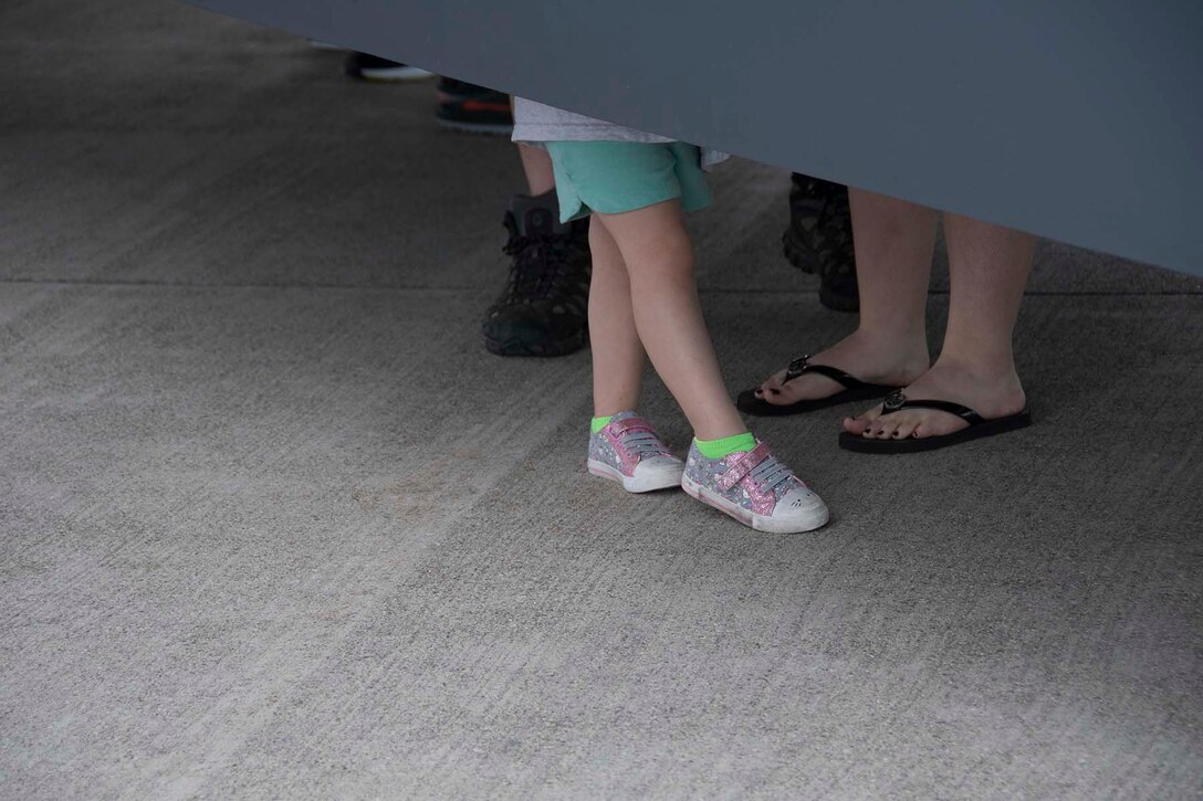 Spectators explore the inside of the bomb bay of a B-52 Stratofortress assigned to the 307th Bomb Wing during the 2018 Thunder of Niagara International Air Show, June 09, 2018, at Niagara Falls Air Reserve Station, N.Y. The air show also featured aerial performances by the U.S. Air Force Thunderbirds, The Canadian Forces Snowbirds, the U.S. Army Black Daggers and many more. (U.S. Air Force Photo by Staff Sgt. Callie Ware)