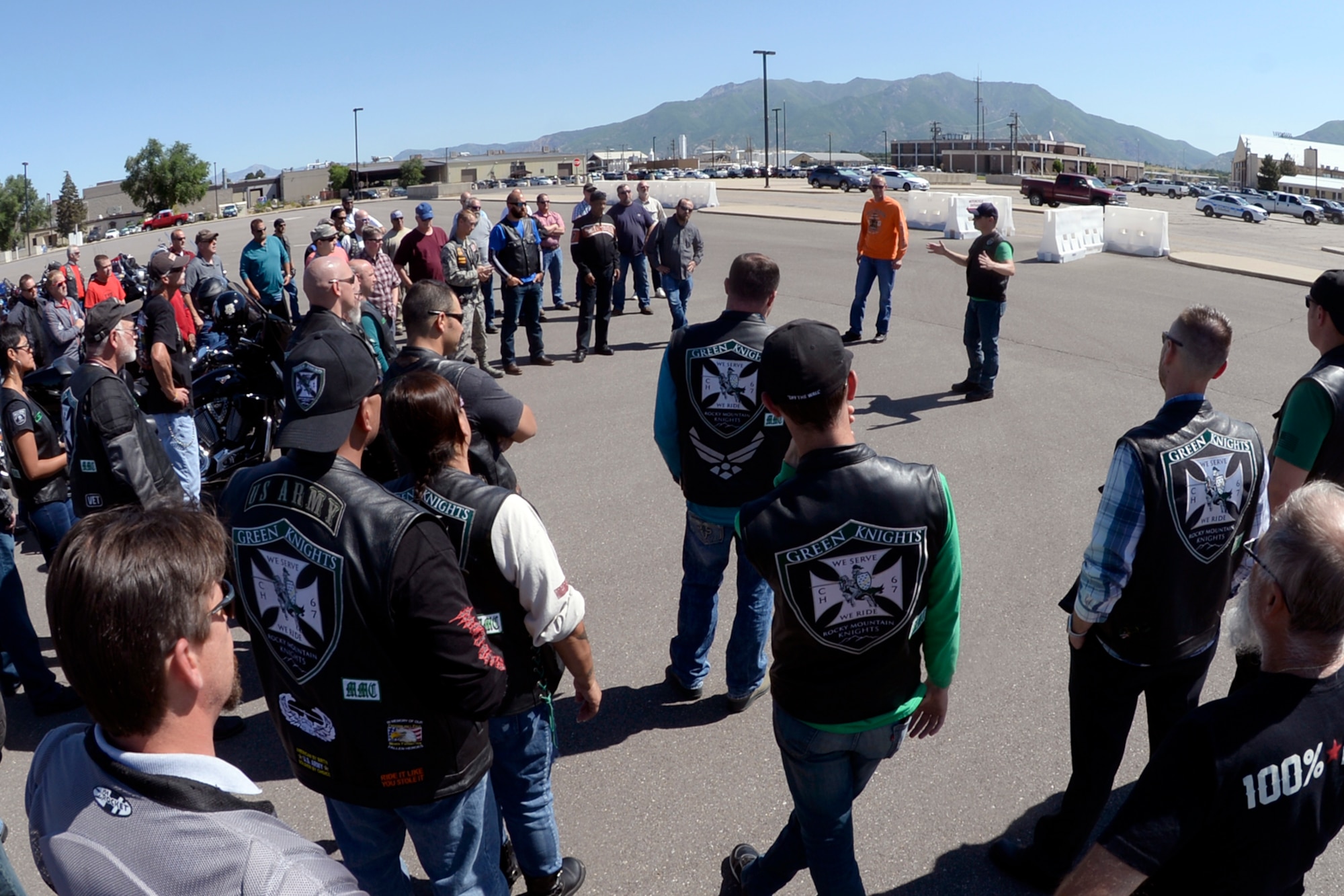 Ride organizers explain the route to motorcyclists during the See Me, Save Me safety campaign ride June 14, 2018, at Hill Air Force Base, Utah. The purpose of the annual event that takes riders on a circular route through local communities is to motivate motorists to share the road by taking a second look, specifically for motorcyclists and other smaller traffic. (U.S. Air Force photo by Todd Cromar)