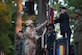 U.S. Army Soldiers from the 7th Transportation Brigade (Expeditionary) place battle streamers on the Army flag during the U.S. Army Training and Doctrine Command Band’s Music Under the Stars concert in honor of the Army’s 243rd Birthday at Joint Base Langley-Eustis, Va., June 15, 2018.