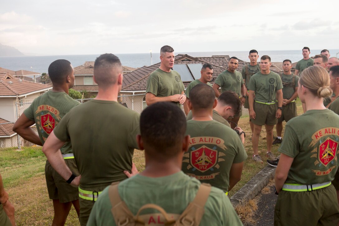 U.S. Marine Corps Lt. Col. Benjamin Harrison, commanding officer, 1st Battalion, 12th Marine Regiment, speaks to his battalion staff noncommissioned officers and officers prior to going to Range 10, Marine Corps Base Hawaii, June 14, 2018. Lt. Col. Harrison ran with the leadership of the battalion for the last time before he relinquishes his command on June 15, 2018. (U.S. Marine Corps photo by Sgt. Zachary Orr)
