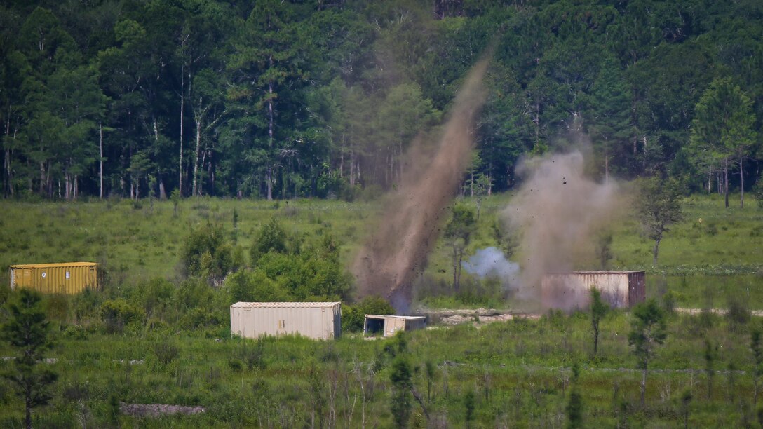 Inert munitions impact at Townsend Bombing Range, Georgia. June 12. F-16 Falcons with the 157th Fighter Squadron, 169th Fighter Wing from McEntire Joint National Guard Base used the range to rehearse air-to-ground training. Aircraft around the Defense Department regularly use the range to practice strafing and dropping inert munitions.