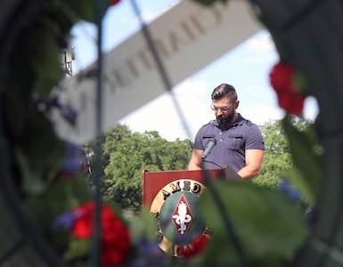 Ryan Shipkey, grandson of the late Sgt. Maj. of the Army Leon L. Van Autreve, spoke about his bond with the Army’s fourth SMA during a wreath-laying ceremony at the Fort Sam Houston National Cemetery June 14.  Shipkey closed his remarks with an audio recording of Van Autreve reciting John McCrae’s “In Flanders Fields.”  Van Autreve served 34 years and is credited with developing the NCO Education System. The Army Medical Department Center & School’s Non-Commissioned Officer Academy hosted the annual ceremony.