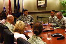 U.S. Air Force Col. Ricky Mills, 17th Training Wing commander, meets with Chief Master Sgt. Luis Reyes, the Army & Air Force Exchange Service’s senior enlisted advisor, at the Norma Brown Building on Goodfellow Air Force Base, Texas, June 14, 2018. Mills and Reyes met to talk about ways the base and AAFES can help each other out. (U.S. Air Force photo by Staff Sgt. Joshua Edwards/Released)