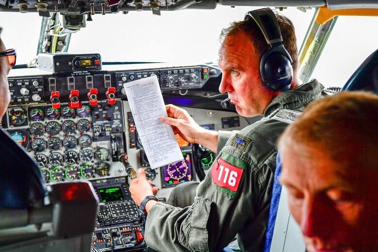 As part of the Employer Support of the Guard and Reserve (ESGR) Bosslift program, the Washington Air National Guard's 141st Air Refueling Wing flew civilian employers on KC-135s where they witnessed F-15s from the 142nd Fighter Wing, Oregon Air National Guard, being refueled.  Col. Johan Deutscher (right), 141st ARW commander goes over checklists June 7, 2018. (U.S. Air National Guard photo by Capt. Colette Muller)