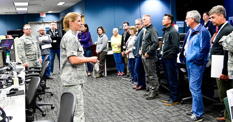 As part of the Employer Support of the Guard and Reserve (ESGR) Bosslift program, civilian employers tour the operations floor of the Western Air Defense Sector June 7, 2018.  Col. Paige Abbott, 225th Support Squadron commander, discusses how the WADS guards America's skies 24/7.  (U.S. Air National Guard photo by Capt. Colette Muller)