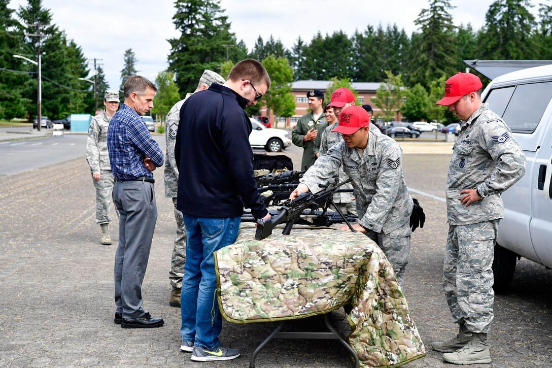As part of the Employer Support of the Guard and Reserve (ESGR) Bosslift program, civilian employers  interact with the 627th Air Base Combat Arms Training and Maintenance personnel (CATM) June 7, 2018.  (U.S. Air National Guard photo by Capt. Colette Muller)
