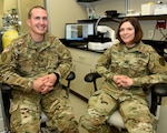 Capt. Andrew W. Holt (left), Ph.D., a former Army field artillery officer, is the new Deputy Director for the Department of Sensory Trauma at the U.S. Army Institute of Surgical Research at Joint Base San Antonio-Fort Sam Houston. Holt, a physiologist, is taking over for Capt. Gina Griffith (right), Ph.D., who just completed her first tour in the Army as a microbiologist at the USAISR and transferring to a deployable unit at Aberdeen Proving Ground, Maryland.