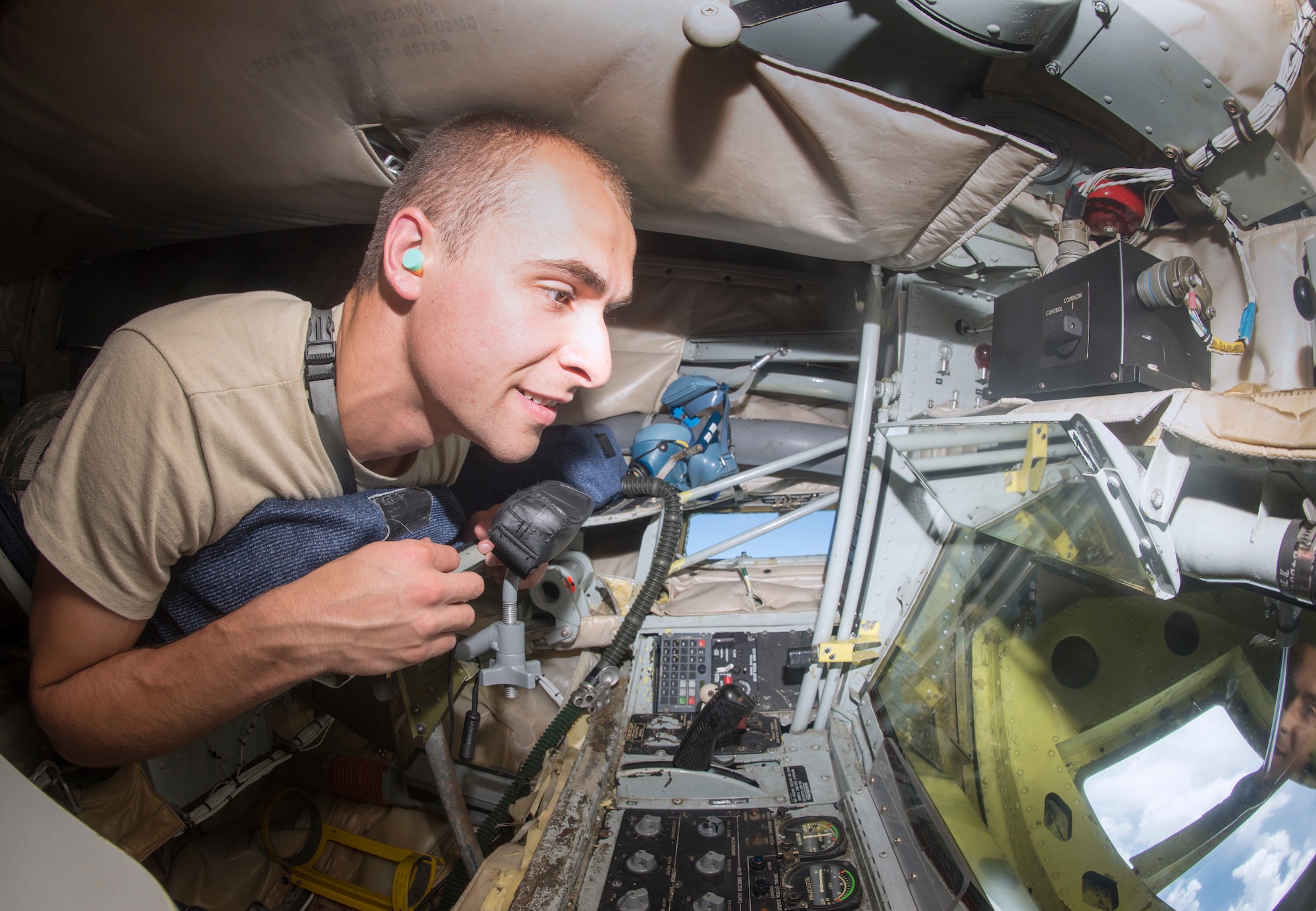 U.S. Air Force Cadet Lt. Col. Matthew Entner, a student of Detachment 643 at Cedarville University in Ohio, experiences what it feels like to be in the boom operator bod during a KC-135 Stratotanker aircraft refueling flight June 14, 2018 over the Eastern United States.