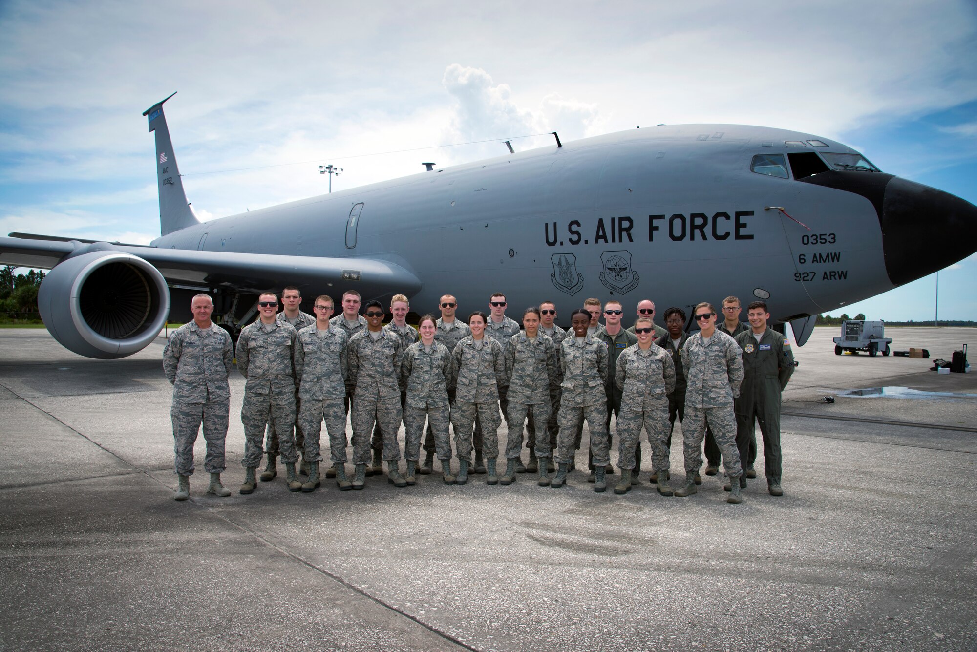 U.S. Air Force Reserve Officer Training Corps (ROTC) cadets pause for a photo with Chief Master Sgt. Michael Lemond, the superintendent assigned to the 6th Mission Support Group, along with KC-135 Stratotanker aircrew at MacDill Air Force Base, Fla., June 14, 2018.