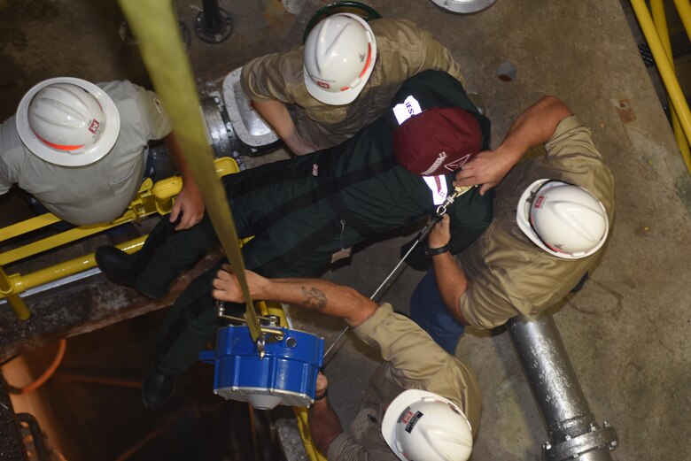 Employees at Old Hickory Hydropower Plant take part in a simulated exercise to extract a training dummy from a confined space during a Confined Space and Confined Space Rescue Course June 14, 2018 in Hendersonville, Tenn. The U.S. Army Corps of Engineers Nashville District trained 32 employees to lead the in-house training in March 2017, which will benefit more than 200 employees across the district who require the annual training. (USACE photo by Lee Roberts)