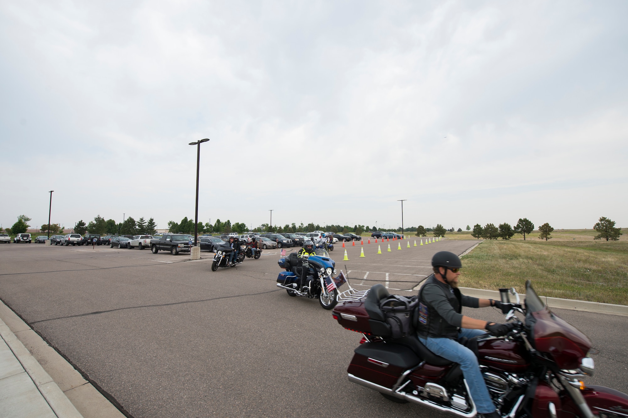 Members of the 460th Space Communication Squadron and the Buckley Riders participate in a memorial ride for Senior Airman Michael S. Snyder June 14, 2018, on Buckley Air Force Base, Colorado. Each year, Team Buckley members gather for the Snyder Ride, which is a remembrance to honor Snyder, who was killed on his motorcycle in 2014 by a drunken driver. (U.S. Air Force photo by Senior Airman Stephen G. Eigel)