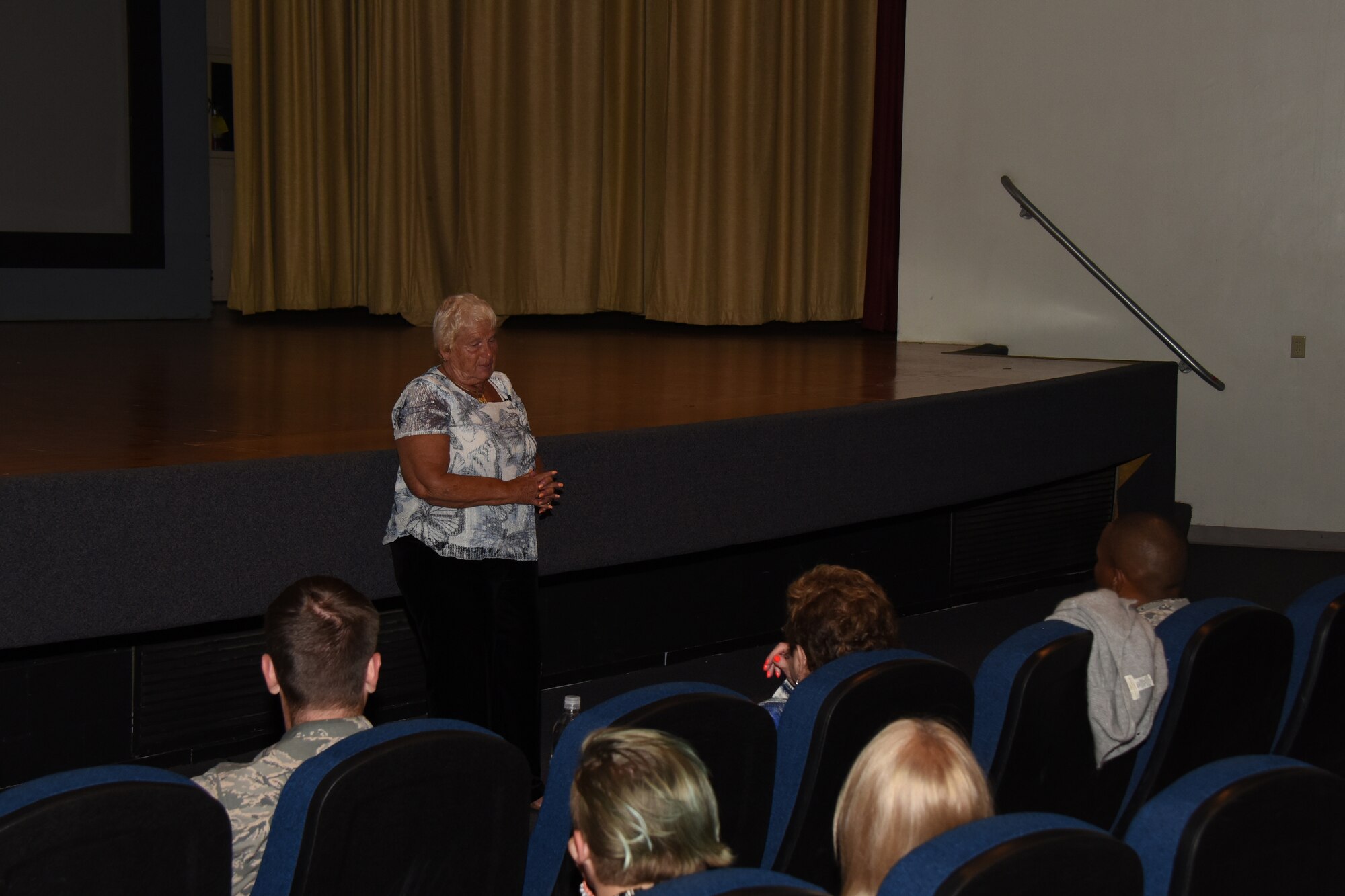 Special guest, survivor of the Warsaw Ghetto, Ms. Wanda Wolosky, speaks on her personal trials and what she overcame, during the Holocaust Remembrance at the Event Center on Goodfellow Air Force Base, Texas, June 14, 2018. Wolosky travels with the Holocaust Military Education Program to address the importance of resiliency and learning from history. (U.S. Air Force Airman 1st Class Zachary Chapman/Released.)