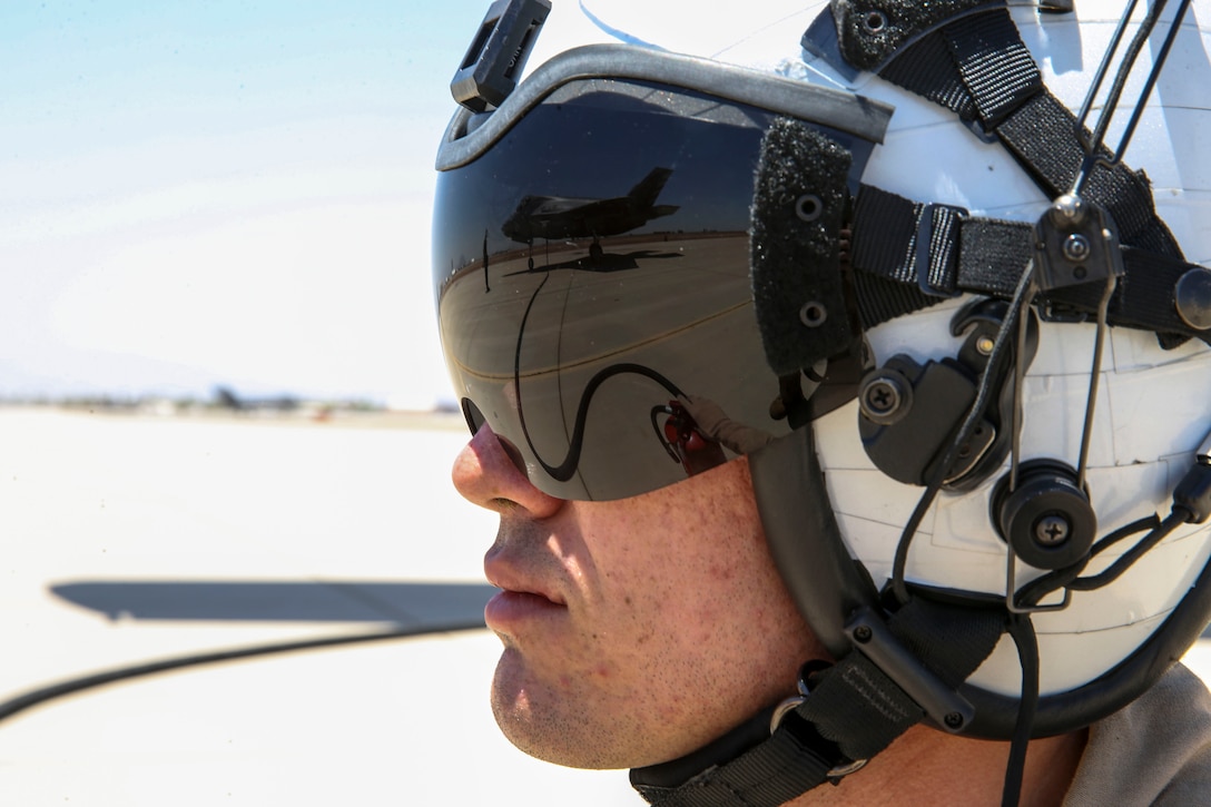 Marines with Marine Aerial Refueler Transport Squadron (VMGR) 352, 3rd Marine Aircraft Wing, provide air-delivered ground refuel services to fixed-wing aircraft at Naval Air Facility El Centro, Calif., June 9. VMGR-352 is conducting their deployment for training at various bases in Southern California and at Kirtland Air Force Base in Albuquerque, N.M., to give Marines real-time preparation for potential missions their squadron might perform in a forward--deployed scenario. (U.S. Marine Corps photo by Sgt. David Bickel/Released)