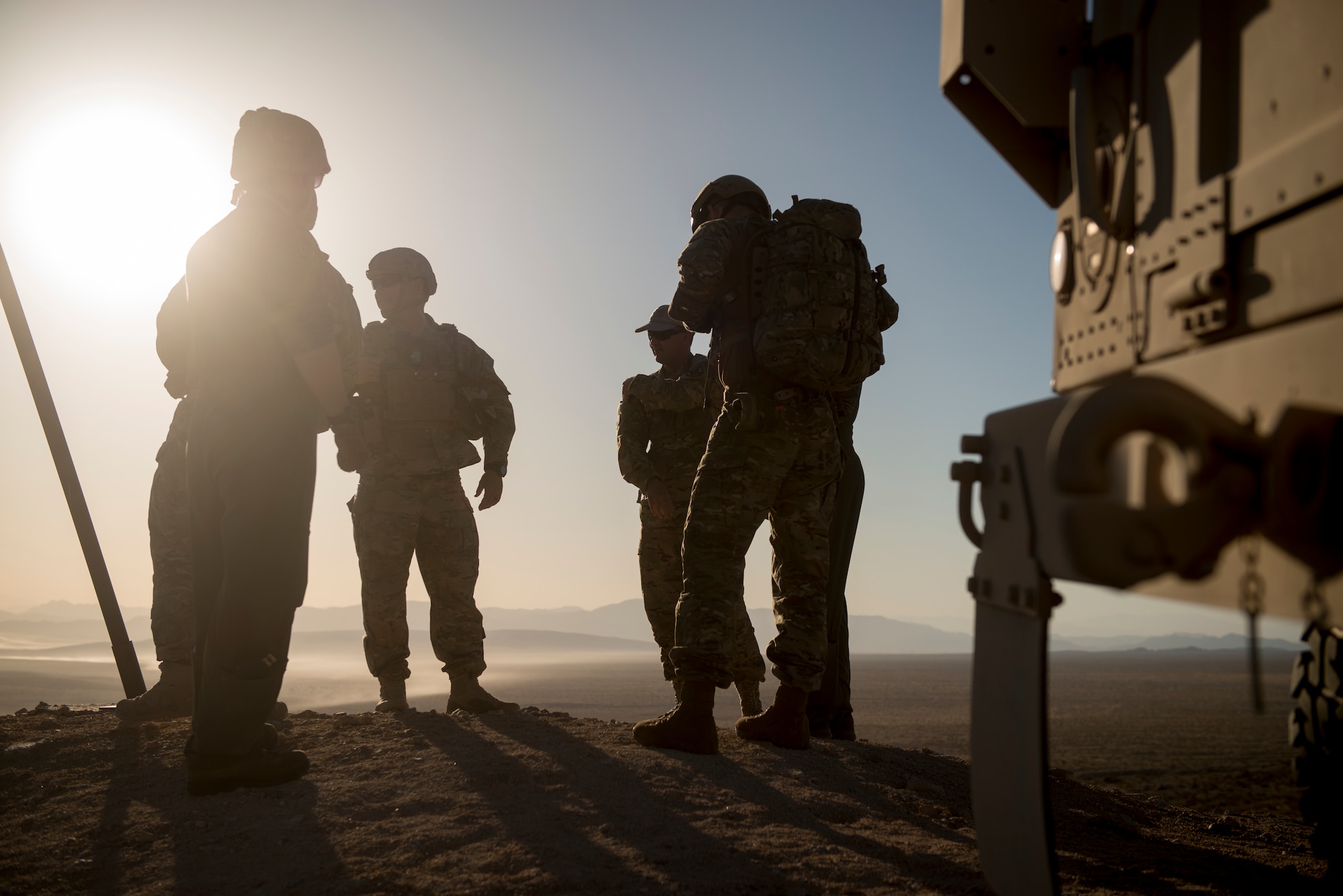 Joint terminal attack controllers brief 391st Fighter Squadron F-15E Strike Eagle pilots during Green Flag West, June 12, 2018, at the National Training Center, Ft. Irwin, California. The NTC replicates the tough, realistic operational environment that America’s war fighters face in combat. (U.S. Air Force photo by Airman 1st Class JaNae Capuno)