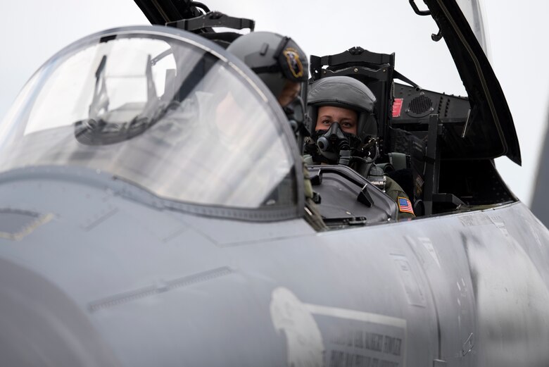 A 493rd Fighter Squadron pilot speaks to U.S. Air Force Academy cadet Christen Dahl prior to her familiarization flight at Royal Air Force Lakenheath, England, June 13. U.S. Air Force Academy cadets visiting as part of “Operation Air Force,” were paired with a pilot from the 493rd FS and learned about their daily operations.  (U.S. Air Force photo/ Senior Airman Malcolm Mayfield)