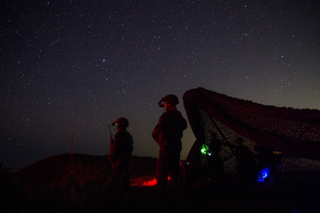Marines with 5th Air Naval Gunfire Liaison Company observe the impacts of friendly close air support on simulated targets during training in Okinawa, Japan, June 5, 2018. During the training, fire support Marines with 5th ANGLICO called in close air support and indirect fire to support simulated allied forces through the suppression and neutralization of a simulated enemy threat. The 31st MEU, the Marine Corps’ only continuously forward deployed MEU, provides a flexible force ready to perform a wide-range of military operations.