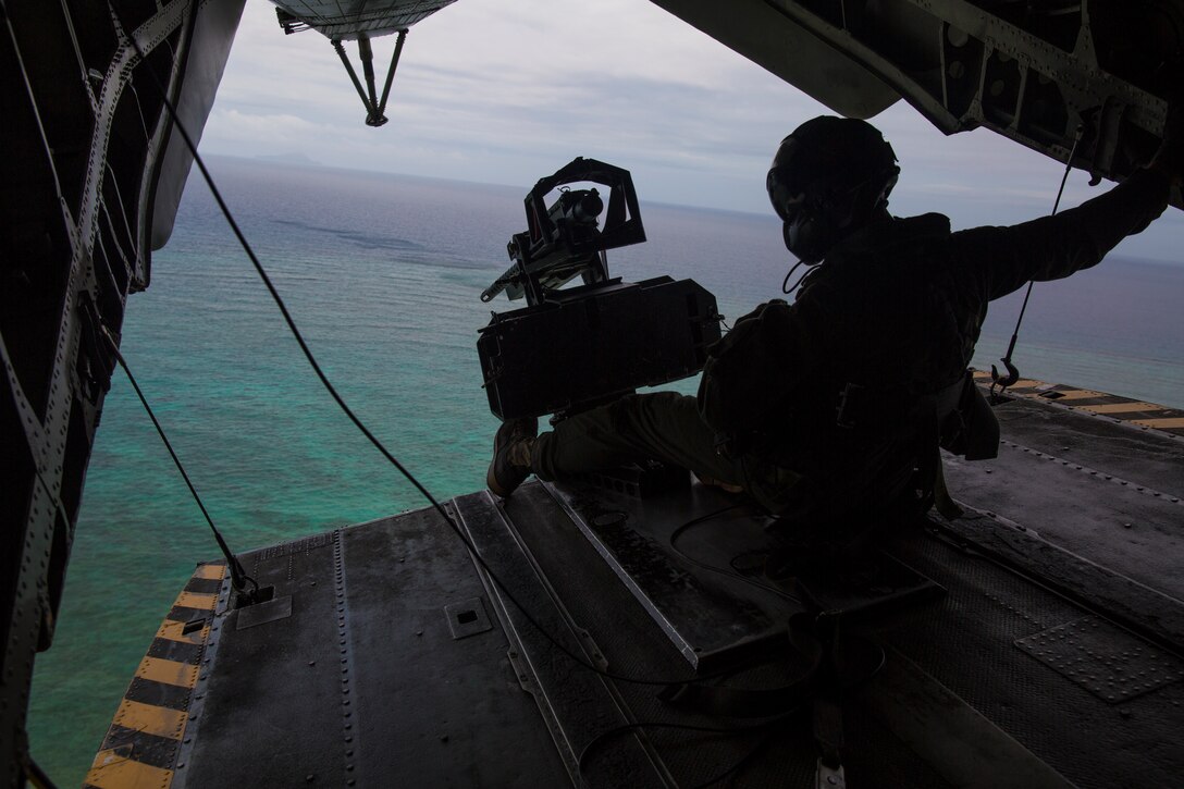 A Marine operates the tail gun of a CH-53E Super Stallion during training in Okinawa, Japan, June 4, 2018. During the training, fire support Marines with 5th Air Naval Gunfire Liaison Company called in close air support and indirect fire to support simulated allied forces by suppressing and neutralizing simulated enemy threats. The 31st MEU, the Marine Corps’ only continuously forward deployed MEU, provides a flexible force ready to perform a wide-range of military operations.