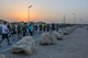 Service members participate in a mental health awareness walk at Al Udeid Air Base, Qatar, May 31, 2018. The walk was hosted by the 379th Expeditionary Medical Group Mental Health Clinic to raise awareness to the many resources available for those experiencing negative mental health symptoms. (U.S. Air Force photo by 1st Lt. Katie Spencer)