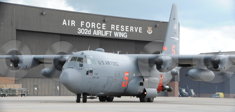 A C-130 Hercules assigned to the 302nd Airlift prepares to depart Peterson Air Force Base, Colorado, July 29, 2017.