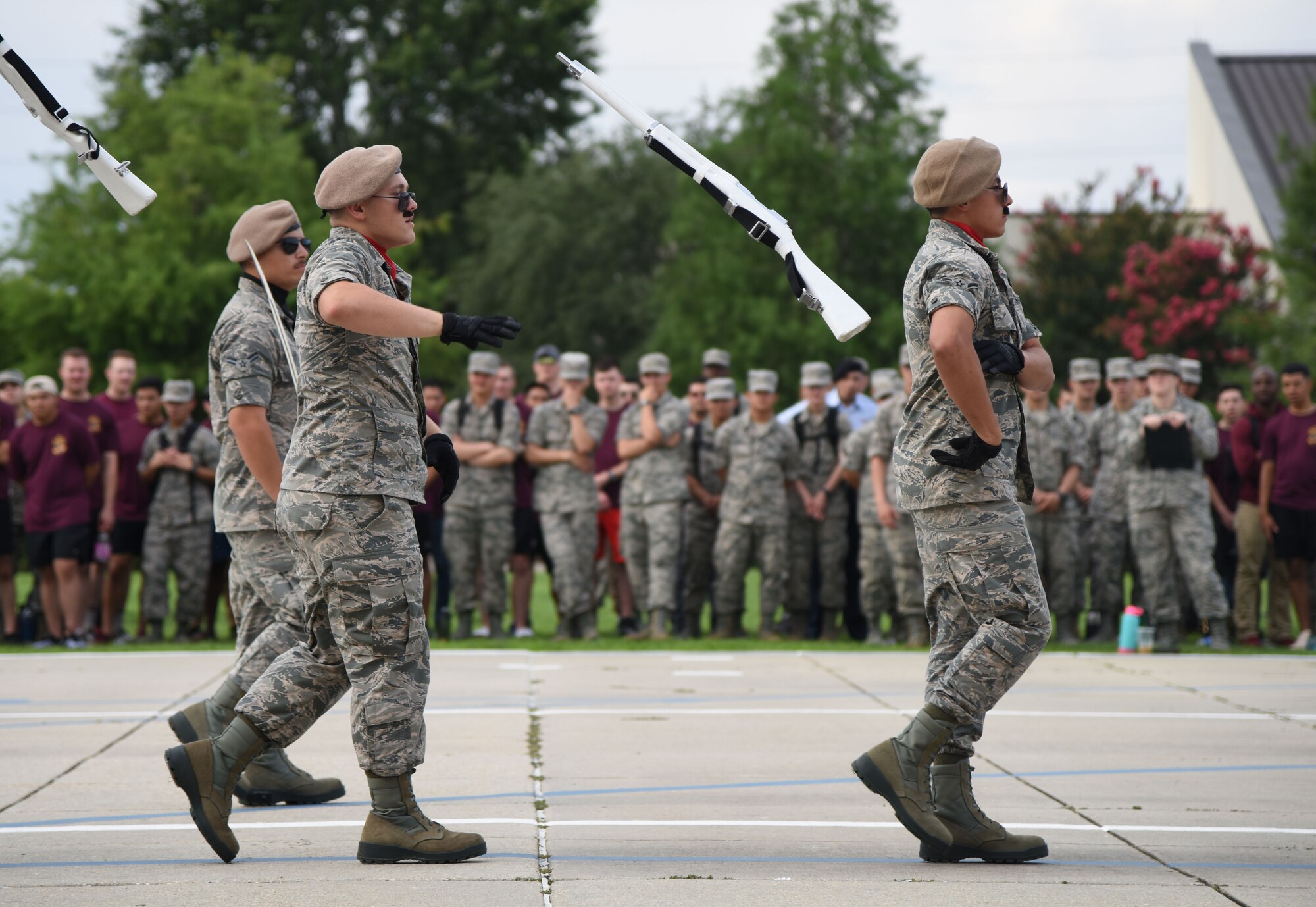 Members of the 335th Training Squadron freestyle drill team perform during the 81st Training Group drill down on the Levitow Training Support Facility drill pad at Keesler Air Force Base, Mississippi, June 15, 2018. Airmen from the 81st TRG competed in a quarterly open ranks inspection, regulation drill routine and freestyle drill routine. (U.S. Air Force photo by Kemberly Groue)