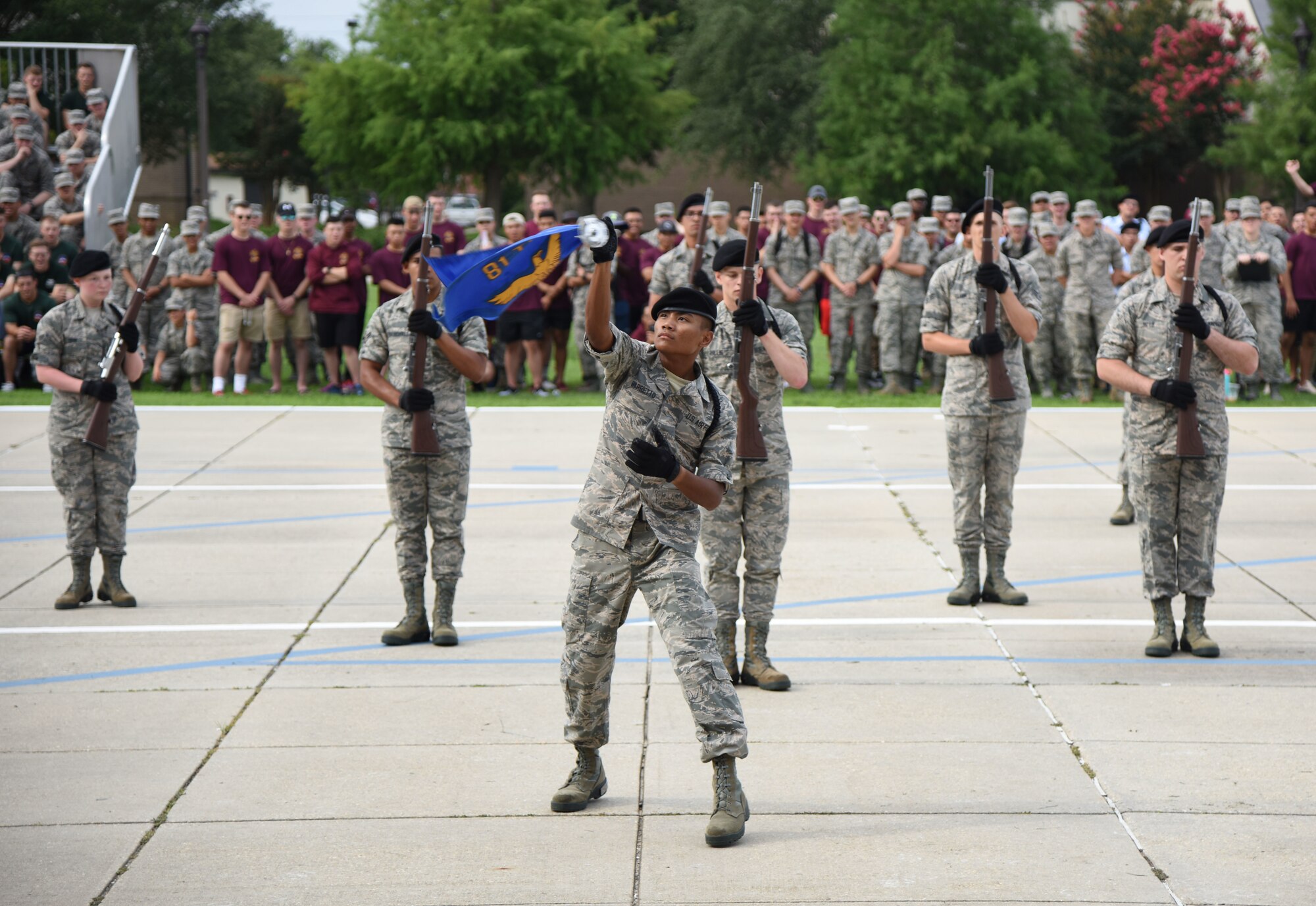Members of the 338th Training Squadron freestyle drill team perform during the 81st Training Group drill down on the Levitow Training Support Facility drill pad at Keesler Air Force Base, Mississippi, June 15, 2018. Airmen from the 81st TRG competed in a quarterly open ranks inspection, regulation drill routine and freestyle drill routine. The 338th TRS “Dark Knights” took first place overall this quarter. (U.S. Air Force photo by Kemberly Groue)