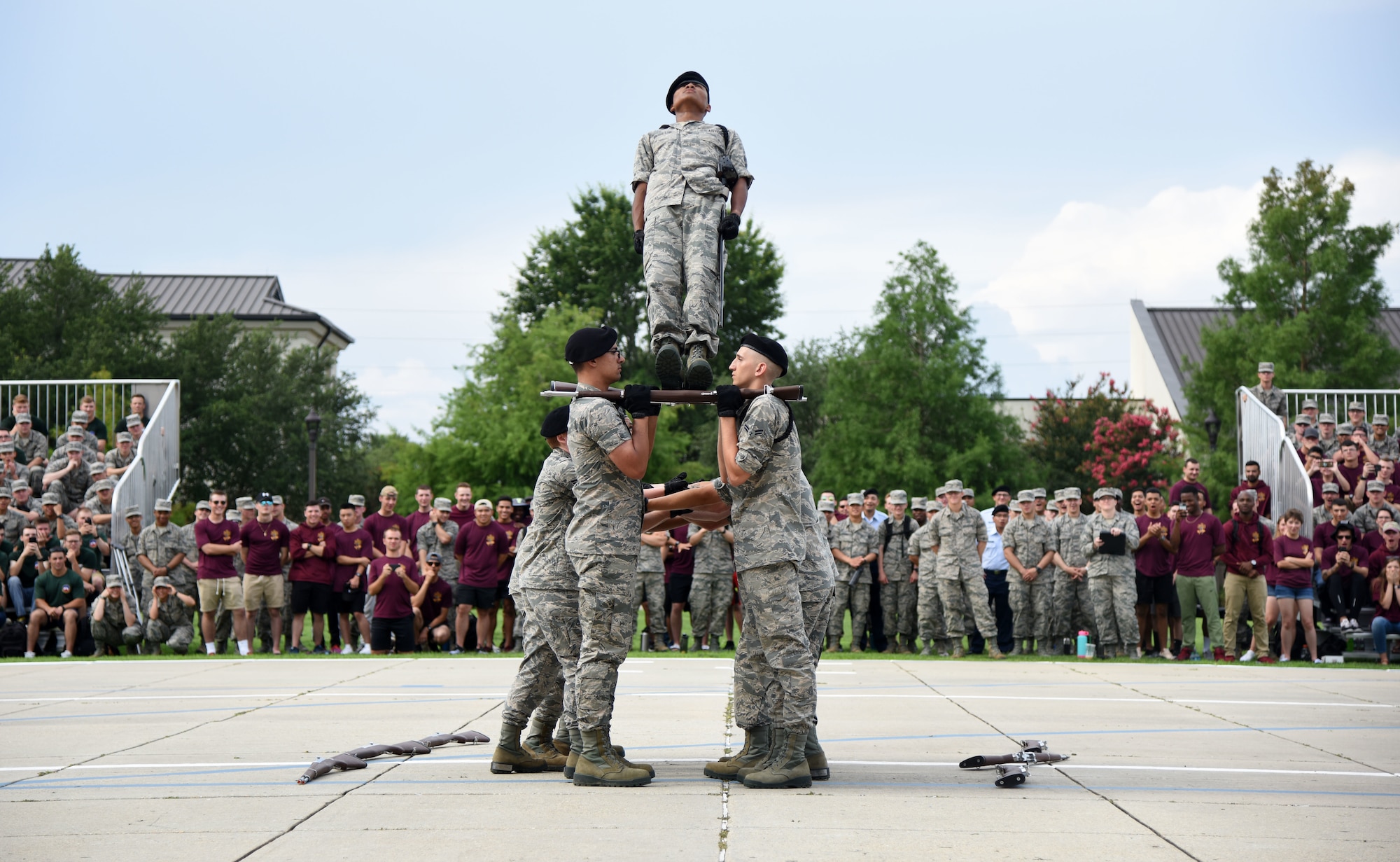 Members of the 338th Training Squadron freestyle drill team perform during the 81st Training Group drill down on the Levitow Training Support Facility drill pad at Keesler Air Force Base, Mississippi, June 15, 2018. Airmen from the 81st TRG competed in a quarterly open ranks inspection, regulation drill routine and freestyle drill routine. The 338th TRS “Dark Knights” took first place overall this quarter. (U.S. Air Force photo by Kemberly Groue)