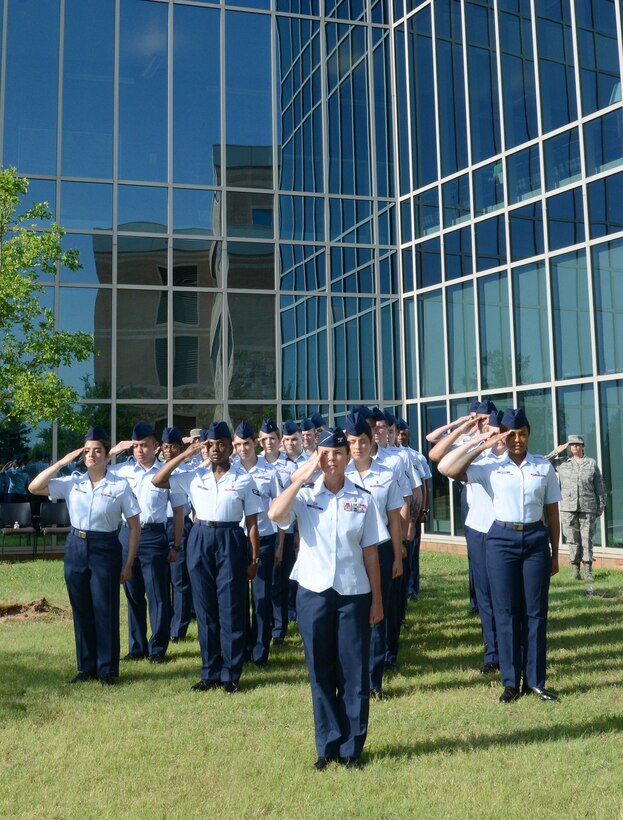 72nd Dental Squadron Commander Col. Dawn Wagner served as the formation commander of 72nd Medical Group members during the change of command ceremony June 11. Formation members rendered their last salute to outgoing commander Col. Christopher Grussendorf and their first salute to their new commander Col. Jennifer Trinkle during the ceremony.
