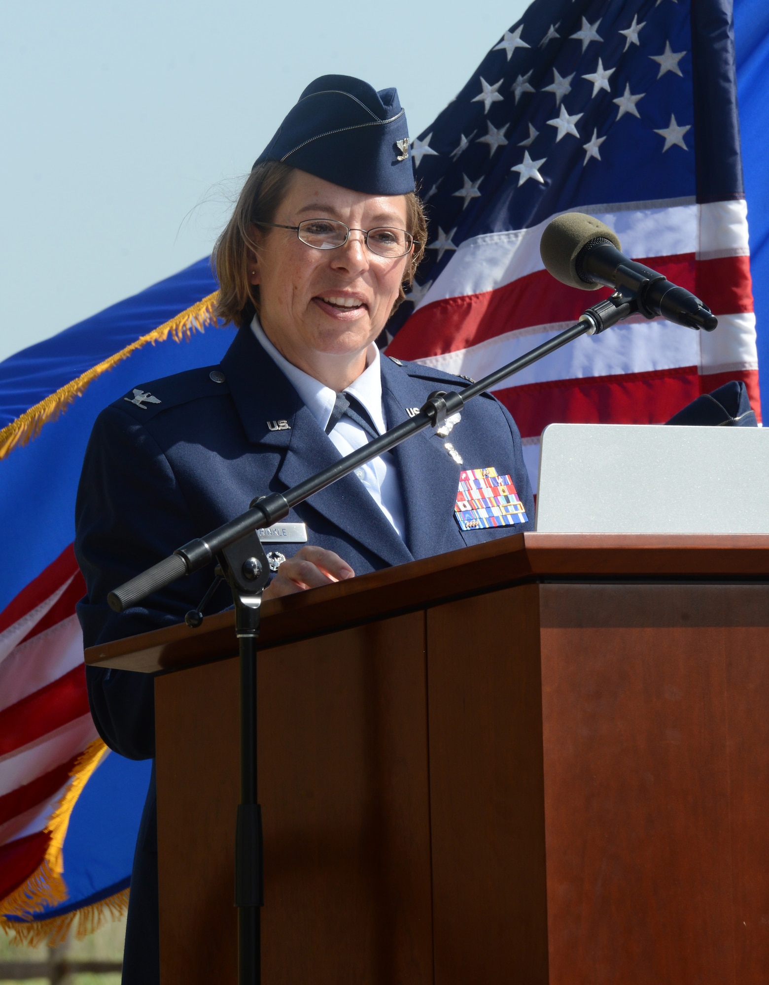 Col. Jennifer Trinkle was welcomed as the new commander of the 72nd Medical Group during a change of command ceremony in the Amn. First Class Lakesha Levy Memorial Garden behind the clinic June 11. Trinkle will command 500 medics to deliver outpatient health services to more than 17,000 enrolled patients and 63,000 regional TRICARE beneficiaries.