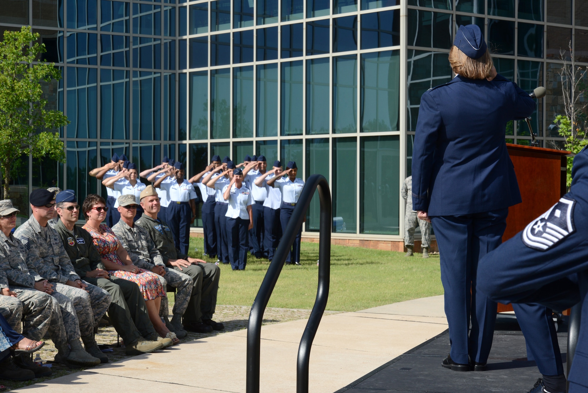 Col. Jennifer Trinket receives her first salute as the new commander of the 72nd Medical Group from members of the clinic during a change of command ceremony June 11.