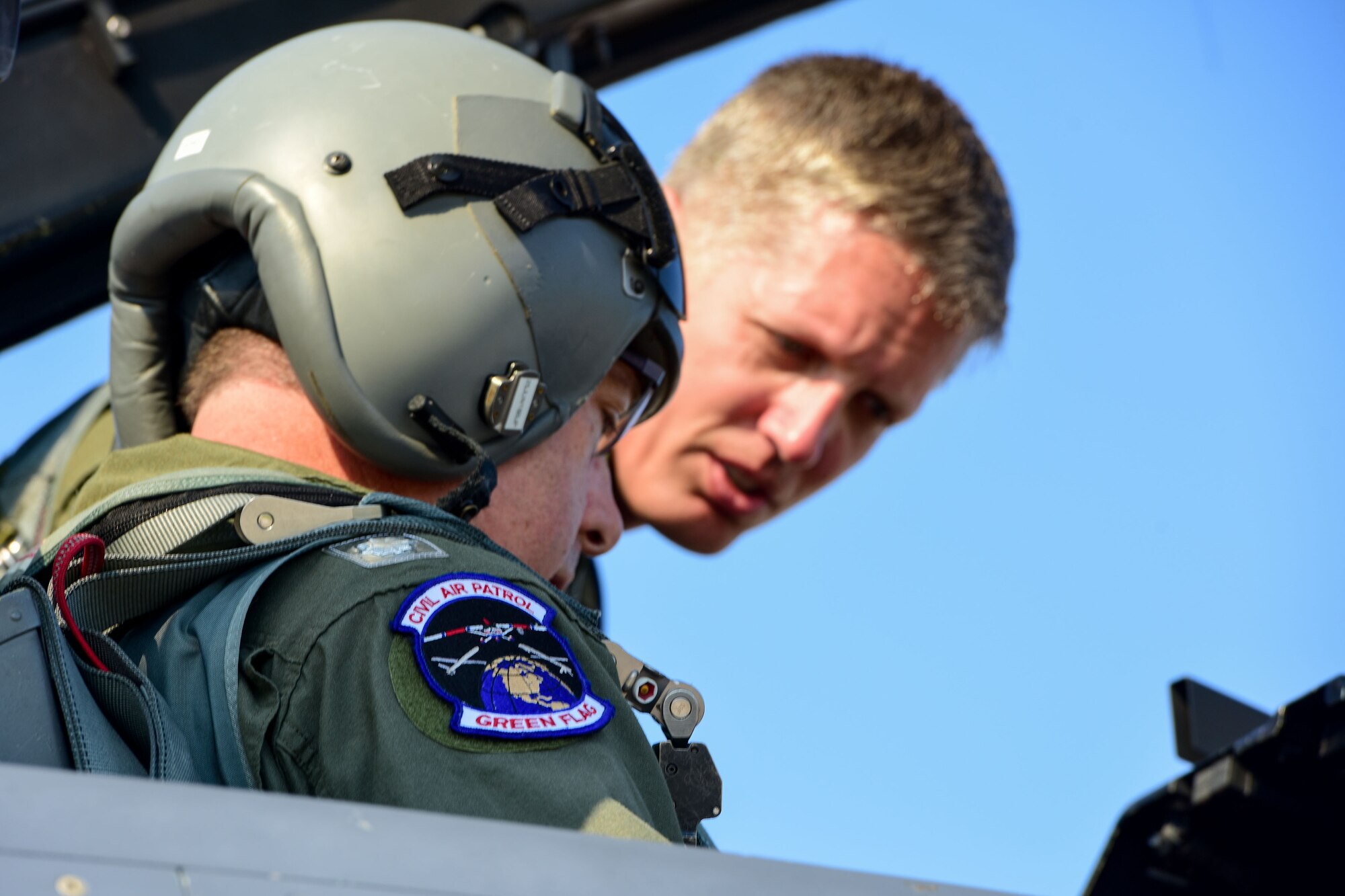 Maj. David Way, F-16 pilot with the 169th Fighter Wing, South Carolina Air National Guard, briefs U.S. Civil Air Patrol Lt. Col. Brett Grooms, the legislative commander of the Civil Air Patrol's South Carolina Wing, prior to an aerospace control alert familiarization flight in an F-16 Fighting Falcon fighter jet June 11. The 169th FW, in close coordination with the Continental U.S. North American Aerospace Defense Command Region, the Eastern Air Defense Sector and the Federal Aviation Administration had recently hosted a Southeast Aerospace Control Alert June 5-7 but weather delays precluded Grooms from flying during the actual SACA event. The conference was a total team training initiative to improve homeland defense capabilities by developing techniques with joint forces during small-scale exercises. This conference consisted of South Carolina Air National Guard 169FW F-16 fighter jets, U.S. Coast Guard Rotary Wing Air Intercept Squadron MH-65D Dolphin helicopters from USCG Air Station Atlantic City and South Carolina Wing Civil Air Patrol aircraft and crews to hone their skills with tactical-level air-intercept procedures. (U.S. Air National Guard photo by Senior Airman Megan Floyd)