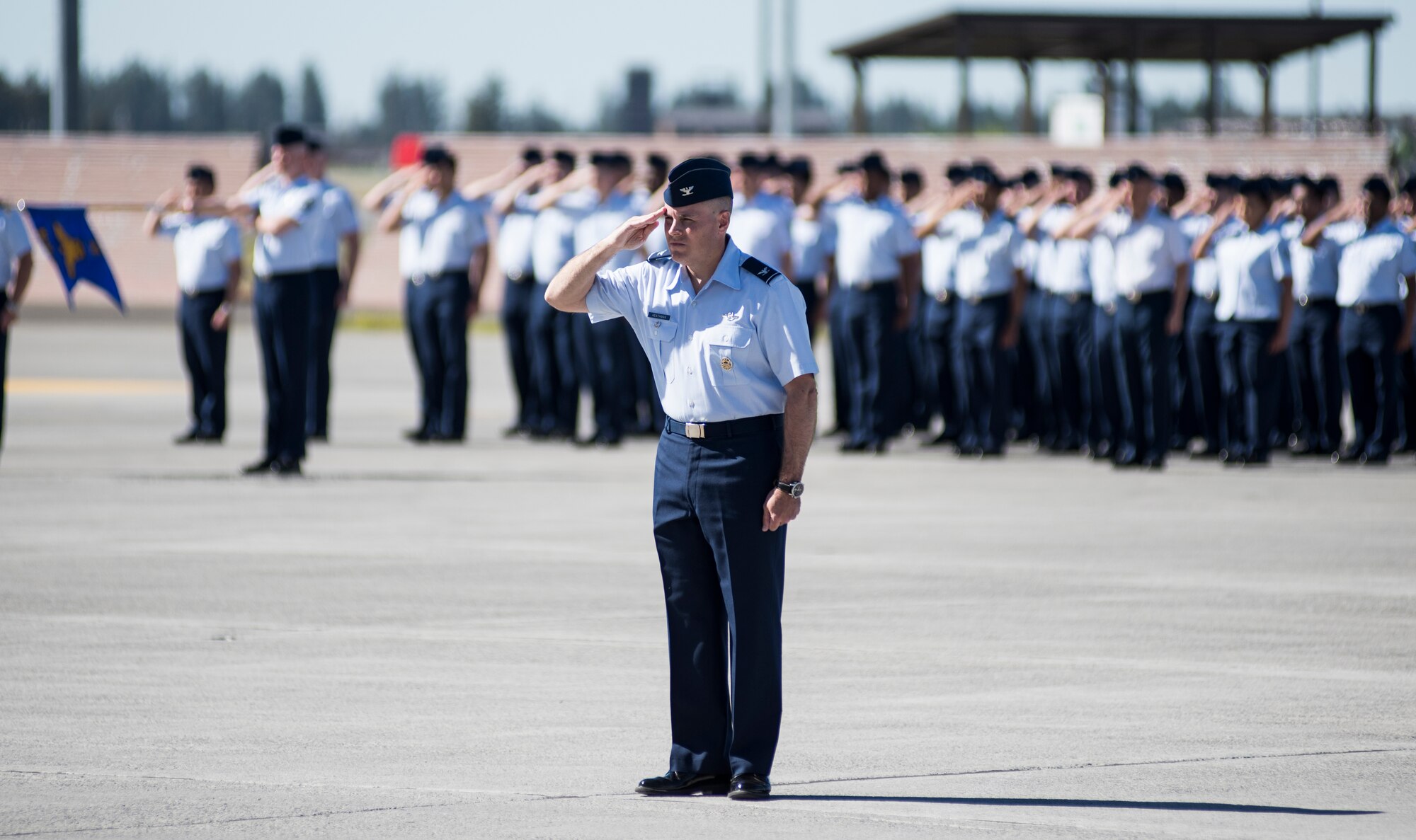 Col. J. Scot Heathman, 92nd Air Refueling Wing vice commander, leads the first salute from Team Fairchild during an assumption of command ceremony June 15, 2018, at Fairchild Air Force Base, Wash. Team Fairchild and the Inland Northwest community came together to welcome Col. Derek M. Salmi as he assumed command of the 92nd ARW. (U.S. Air Force photo/ Senior Airman Sean Campbell)