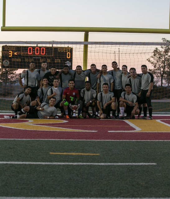 Marine Corps Communication-Electronics School was victorious in the installation’s intramural soccer finals at Felix Field aboard the Marine Corps Air Ground Combat Center, Twentynine Palms, Calif., June 7, 2018. The MCCES team defeated the Headquarters Battalion team 3-0.  (U.S. Marine Corps photo by Lance Cpl. Dave Flores)