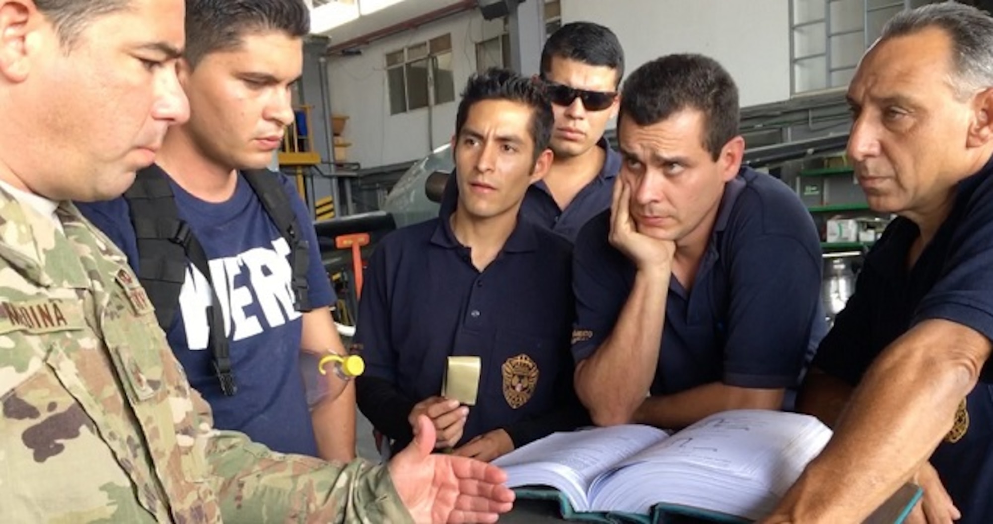 Master Sgt. Alejandro Medina, 571st Mobility Support Advisory Squadron senior air advisor, advises the Costa Rican air vigilance service on the importance of deliberately following all procedures as outlined in the technical orders, during a three-week building partnership capacity mission with the SVA, May 16 through June 9, 2018. The mobility training team's mission was to train and advise the SVA in aircraft interdiction, aircraft maintenance, base defense and dog handling as they continue to counter illicit drug trafficking throughout the region. (U.S. Air Force photo by Maj. Noelle DeRuyter)